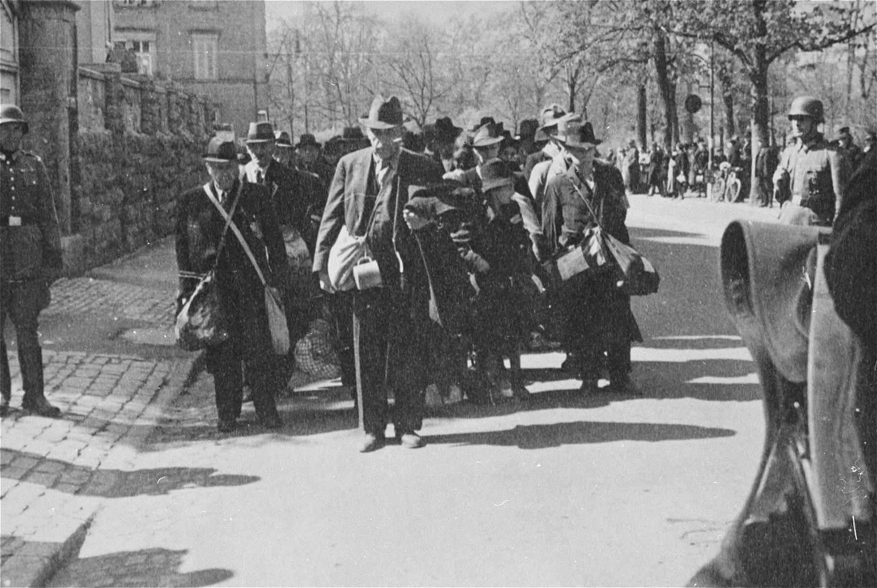 Jewish Deportees Carrying A Few Personal Belongings In Bundles