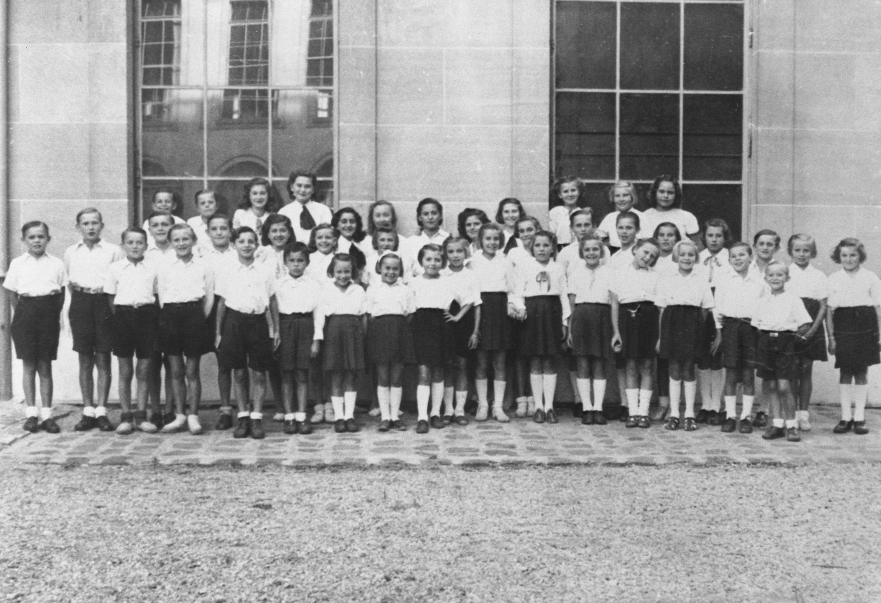 Members of the MACE (Masion d'Accueil Chretienne pour Enfants) children's choir, many of whom had been in hiding during the war.

Those pictured include Helene Reichenberg, Isabelle Reichl and Marthe Levai.