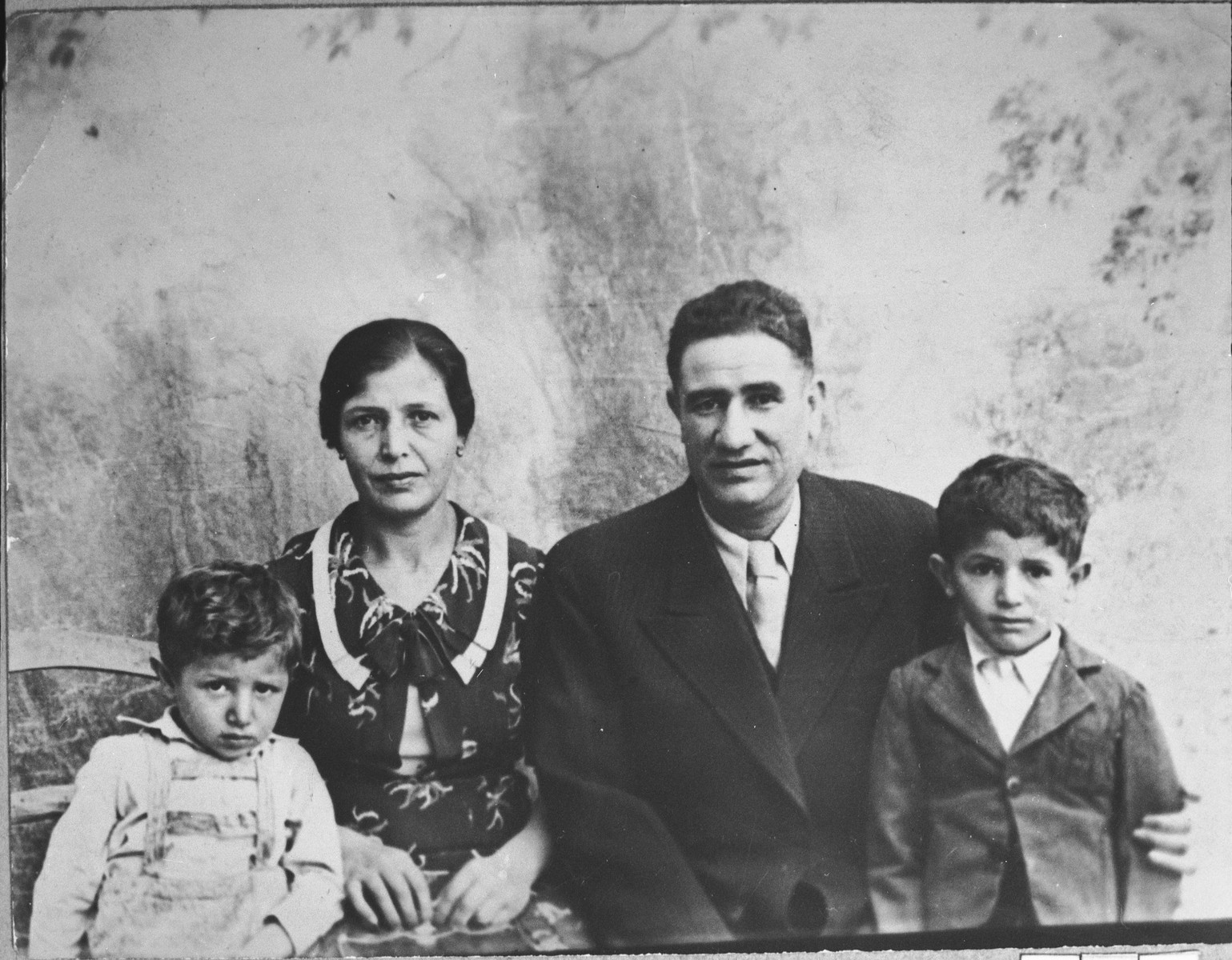 Portrait of Pinhas Kassorla, his wife, Arnesta, and children.  Pinhas was a second-hand dealer.  They lived at Zmayeva 8 in Bitola.