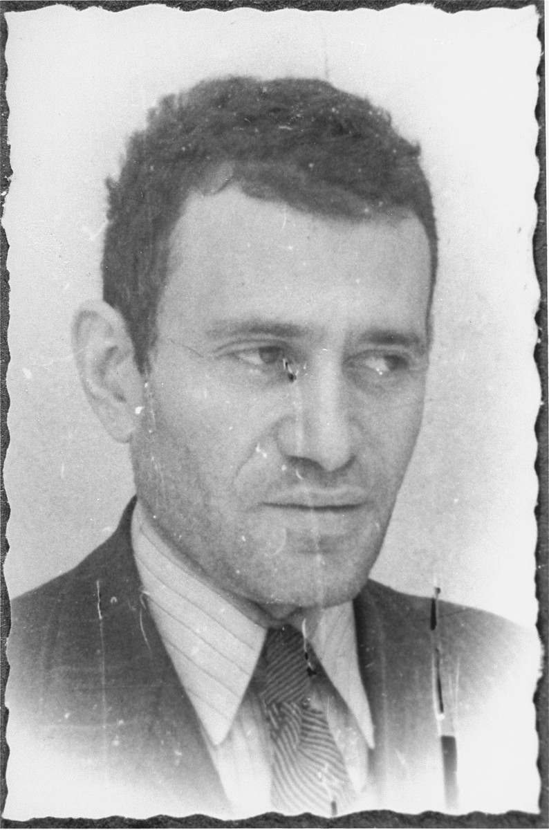 Studio portrait of a member of the administrative staff of the Kielce ghetto Judenrat (Jewish council).

This photo was one the images included in an official album prepared by the Judenrat of the Kielce ghetto in 1942.