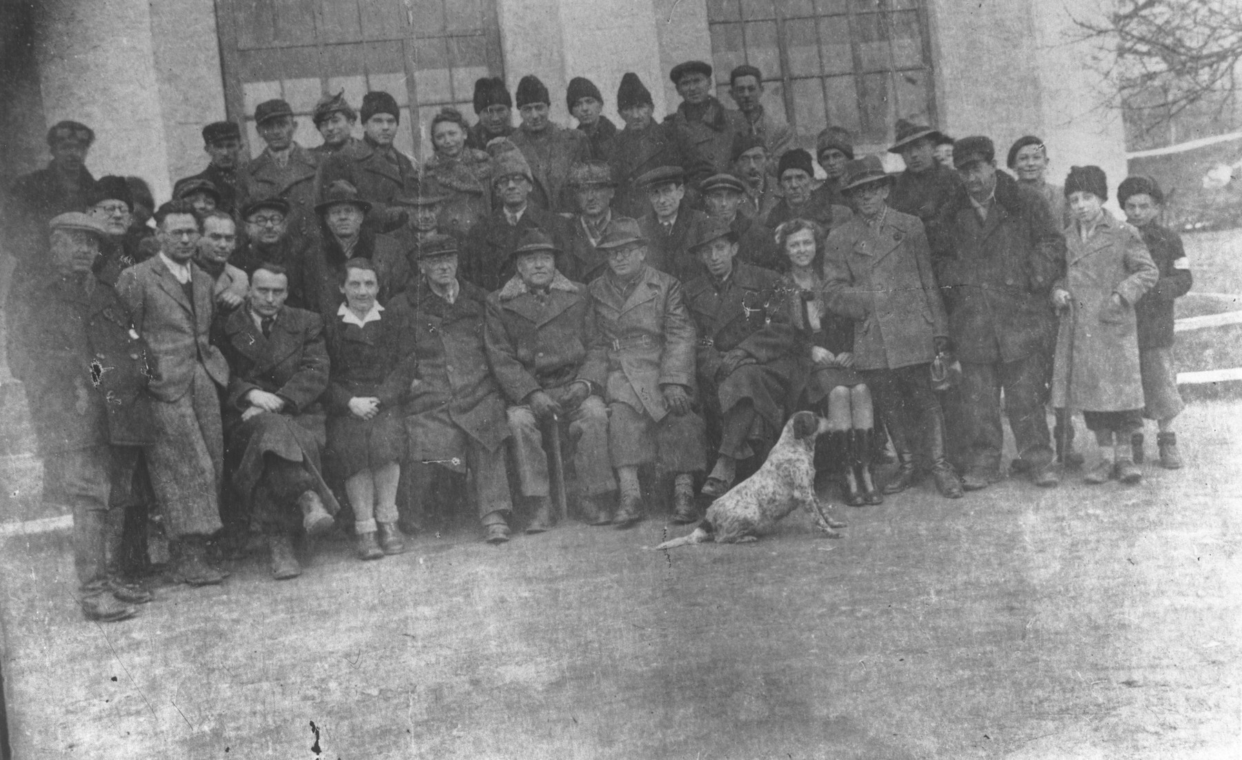 Group portrait of Jewish forced laborers at the Turnatoria, the machine shop established by Siegfried Jagendorf in the Mogilev-Podolskiy foundry.

Shaul Weinstock and  his mother, Lina Weinstock. have been tentatively identified in the first row, on the left.
