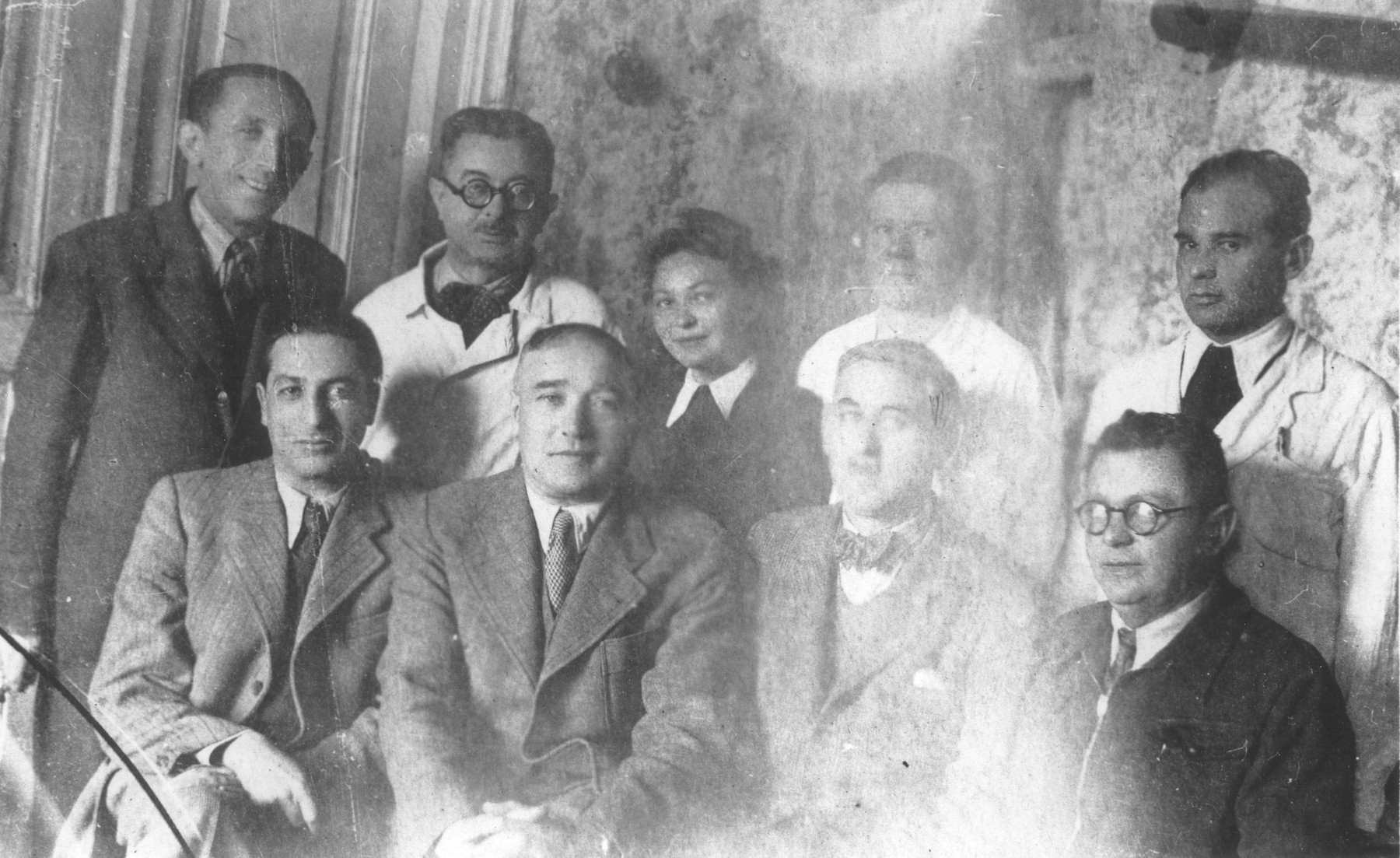 Group portrait of members of the medical staff of the Turnatoria, the machine shop established by Siegfried Jagendorf in the Mogilev-Podolskiy foundry.

Pictured from right to left in the front row are: Dr. B. Budick, Siegfried Jagendorf, Dr. F. Stern, Pinchas Katz.  In the second row are: Max Heissmann, [other identifications unclear].