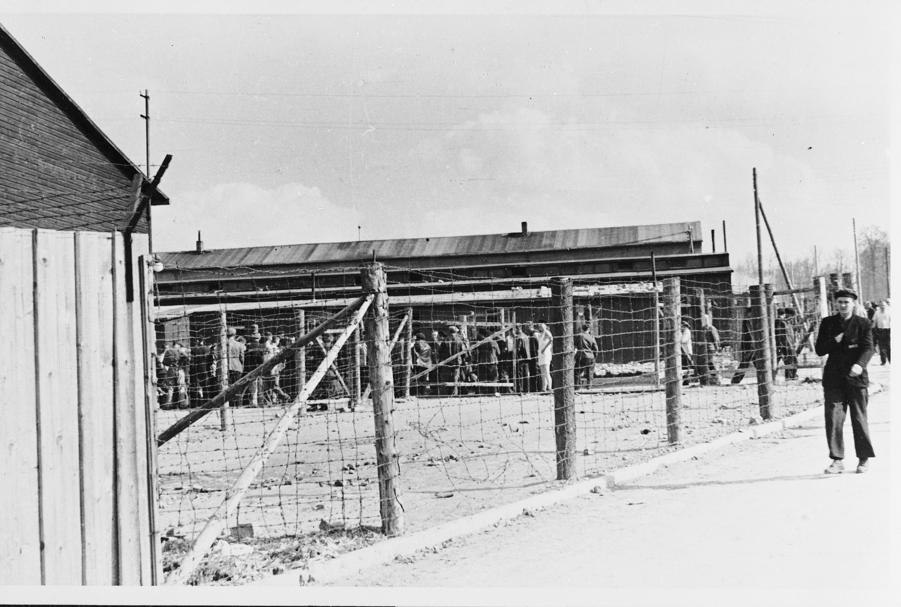 View of a fenced off section of the Buchenwald concentration camp soon after the liberation.