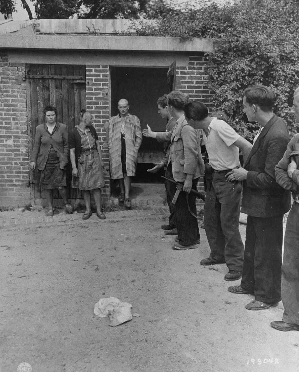 Three women who consorted with the Germans during the occupation are released after being publicly humiliated by the French resistance.  The women's heads were shaven as part of their punishment.