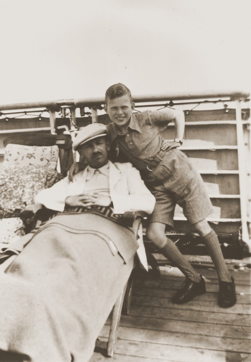 Herbert Karliner poses with his father, Joseph, on the deck of the MS St. Louis.