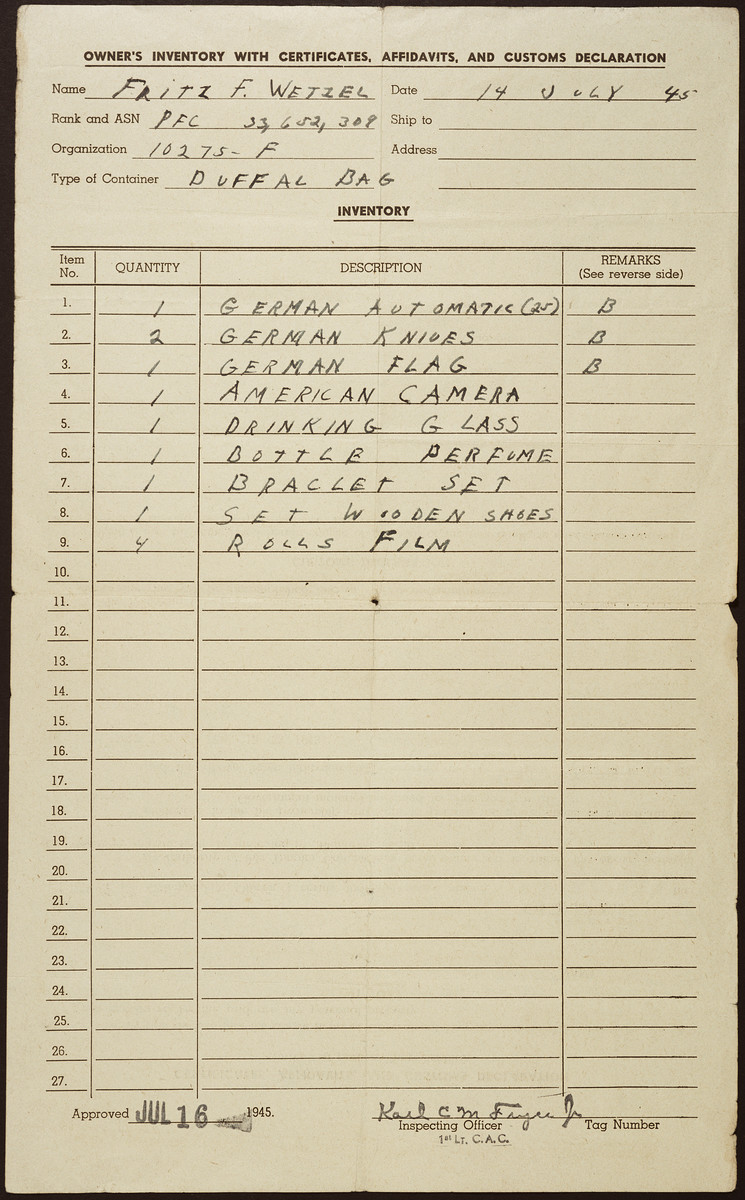 Inventory of captured enemy equipment being shipped home by Pfc Fritz Wetzel.

Included in the list are weapons, a flag, a camera, personal items and four rolls of film.