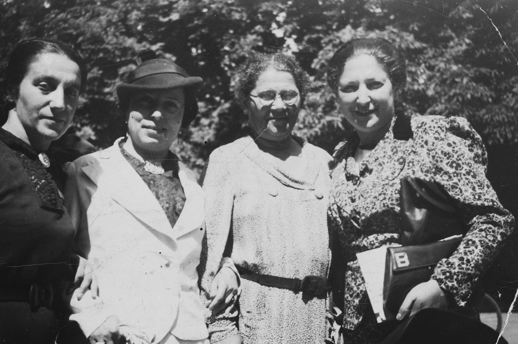 Portrait of four Slovak Jewish women.

Beatte Hartvig is on the far left.  Next to her is Gisi Fleischmann.