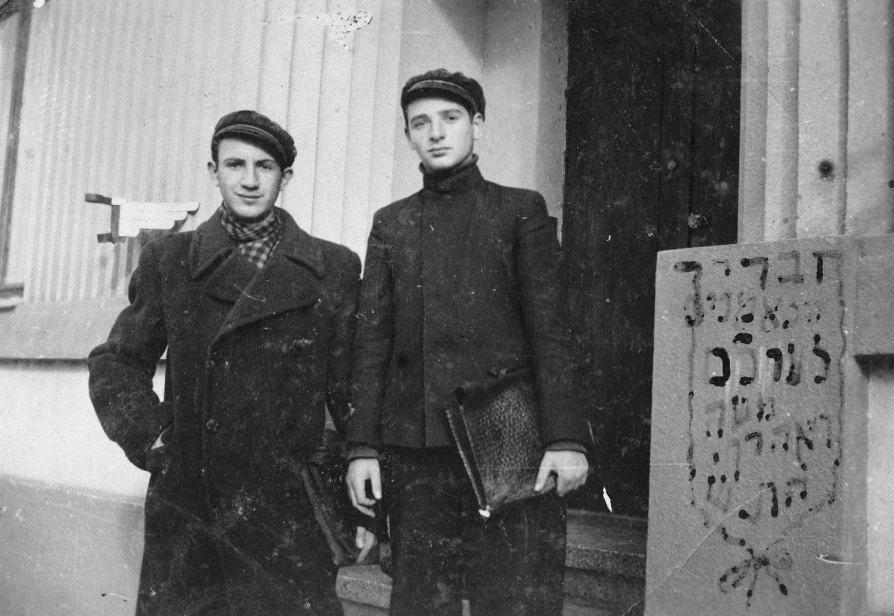 Close-up portrait of two Lithuanian Jewish teenagers.

Pictured are Moshe Strazdanski and Aharon Nun.