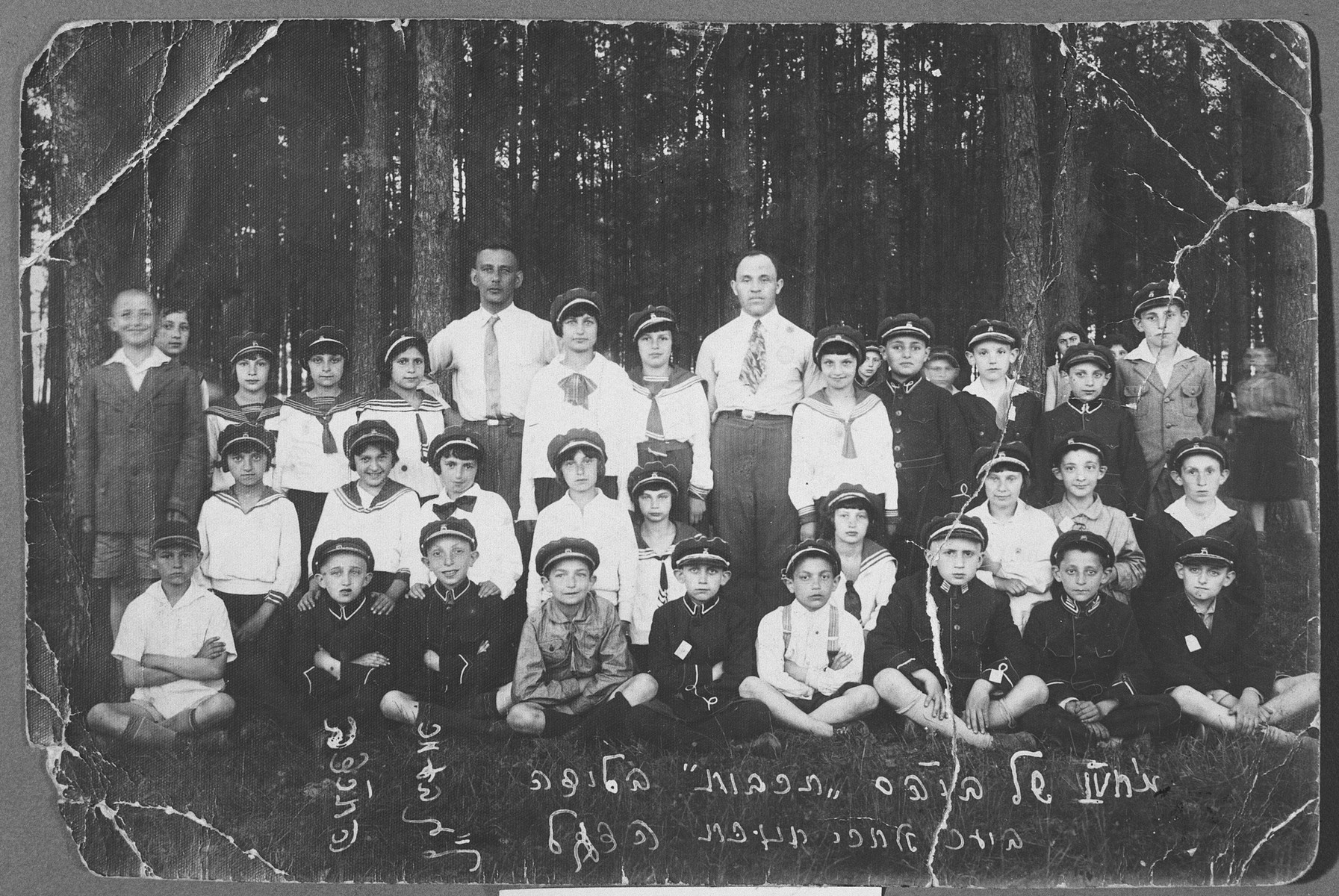 Group portrait of children in the Hebrew Tarbut school in Lida.  

Standing first from the left is Eliezer Szmulowicz.