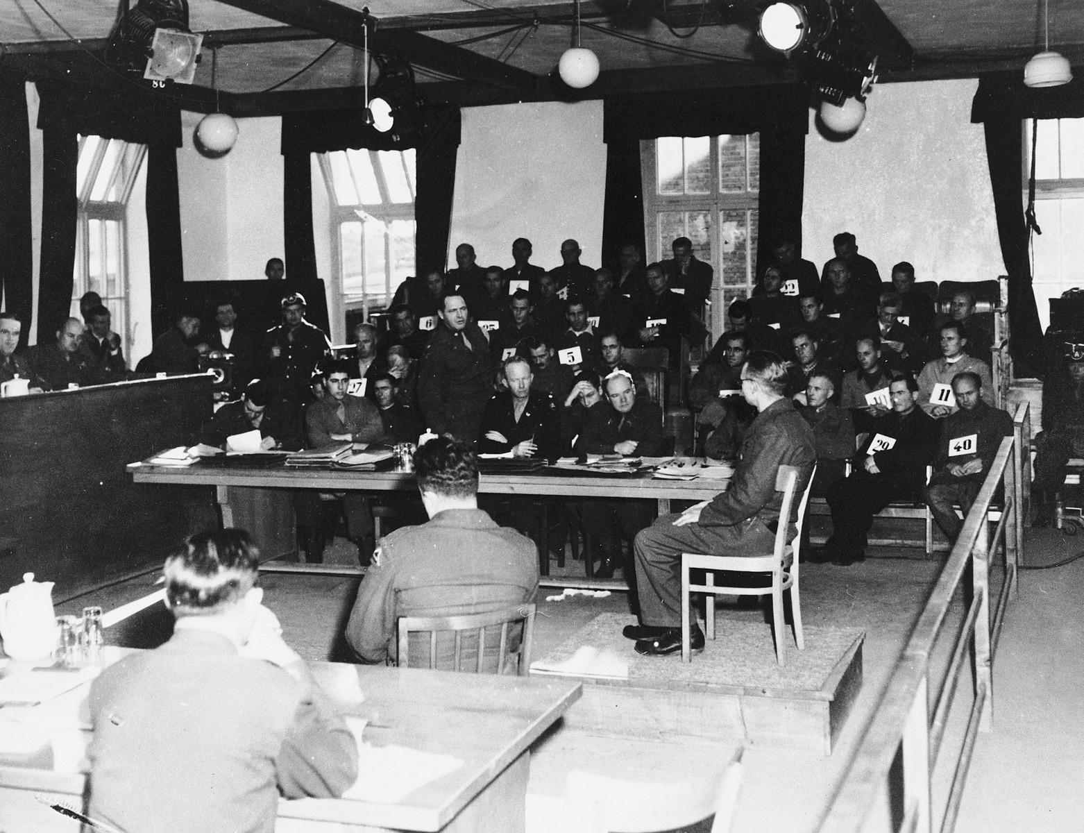 View of the courtroom and proceedings of the first Dachau trial.