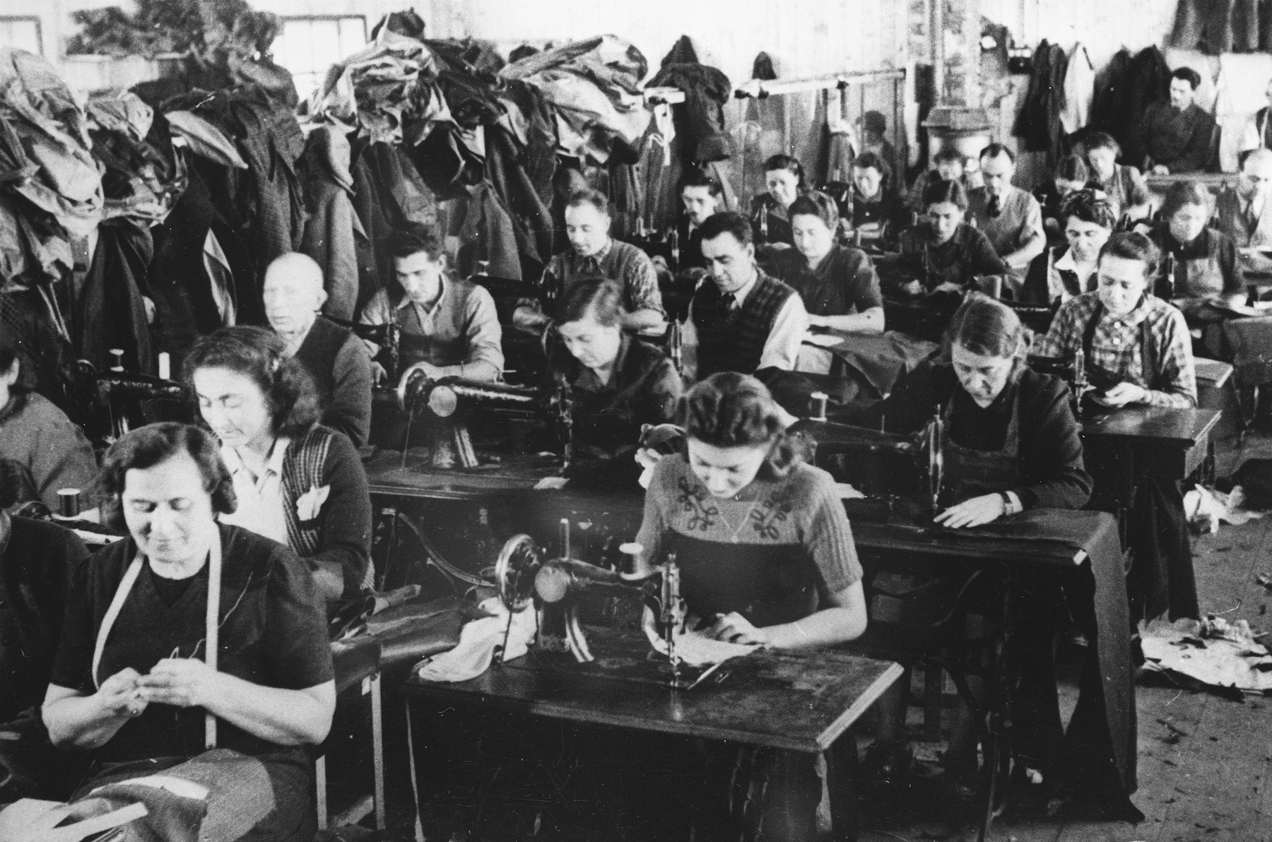 Prisoners operate sewing machines at a Slovak labor camp.