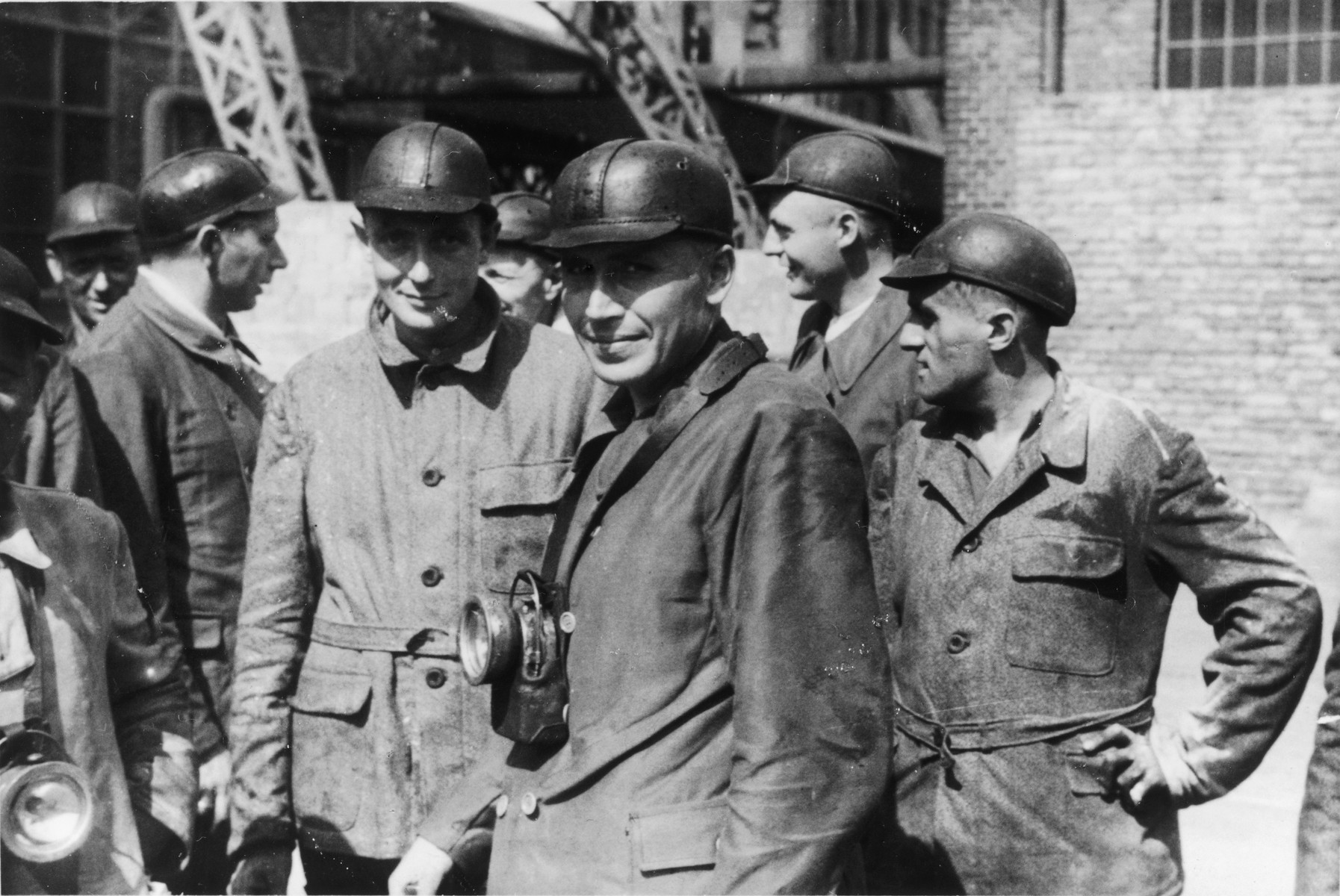 A large group of SS officers visit a coal mine near Auschwitz.

The original caption reads "Besichtigung eines Kohlenbergwerks." (visiting a coal mine)

Pictured from left to right are unknown, Dr. Heinz Baumkoetter, Gerhard Gerber, Dr. Enno Lolling (partially obscured) , Karl Hoecker (center), Dr. Eduard Wirths and Alfred Trzebinski.