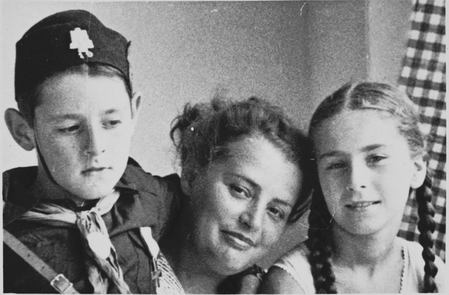 Close-up portrait of Sergio Minerbi, his mother Fanny and non-Jewish friend taken in the summer of 1938, on the eve of the Racial Laws.

Sergio Minerbi is wearing a Balilla uniform.