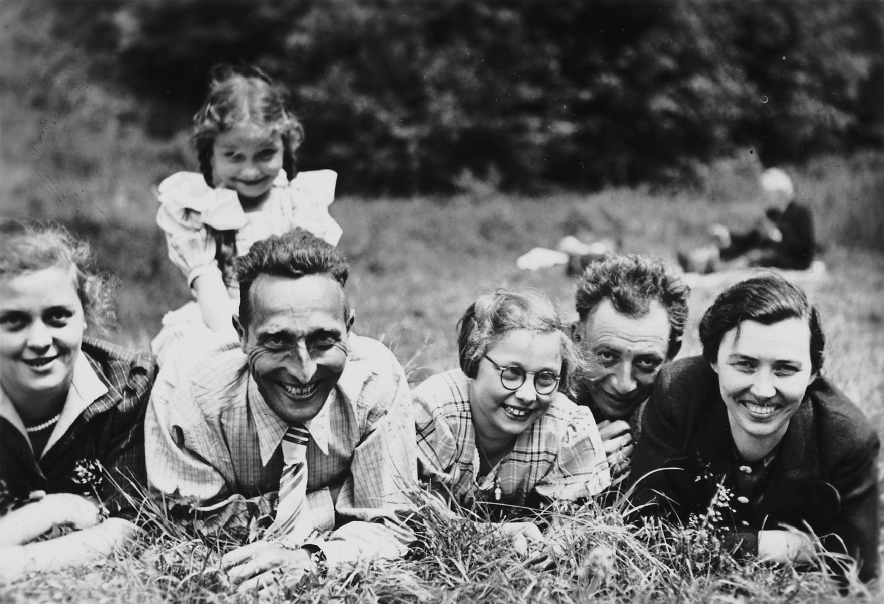 An intermarried German-Jewish family poses for a pictures while on a Sunday walk in the woods with Jewish friends.

Pictured on the left are Margot, Aloisia, Richard and Hannelore Schwarzschild.