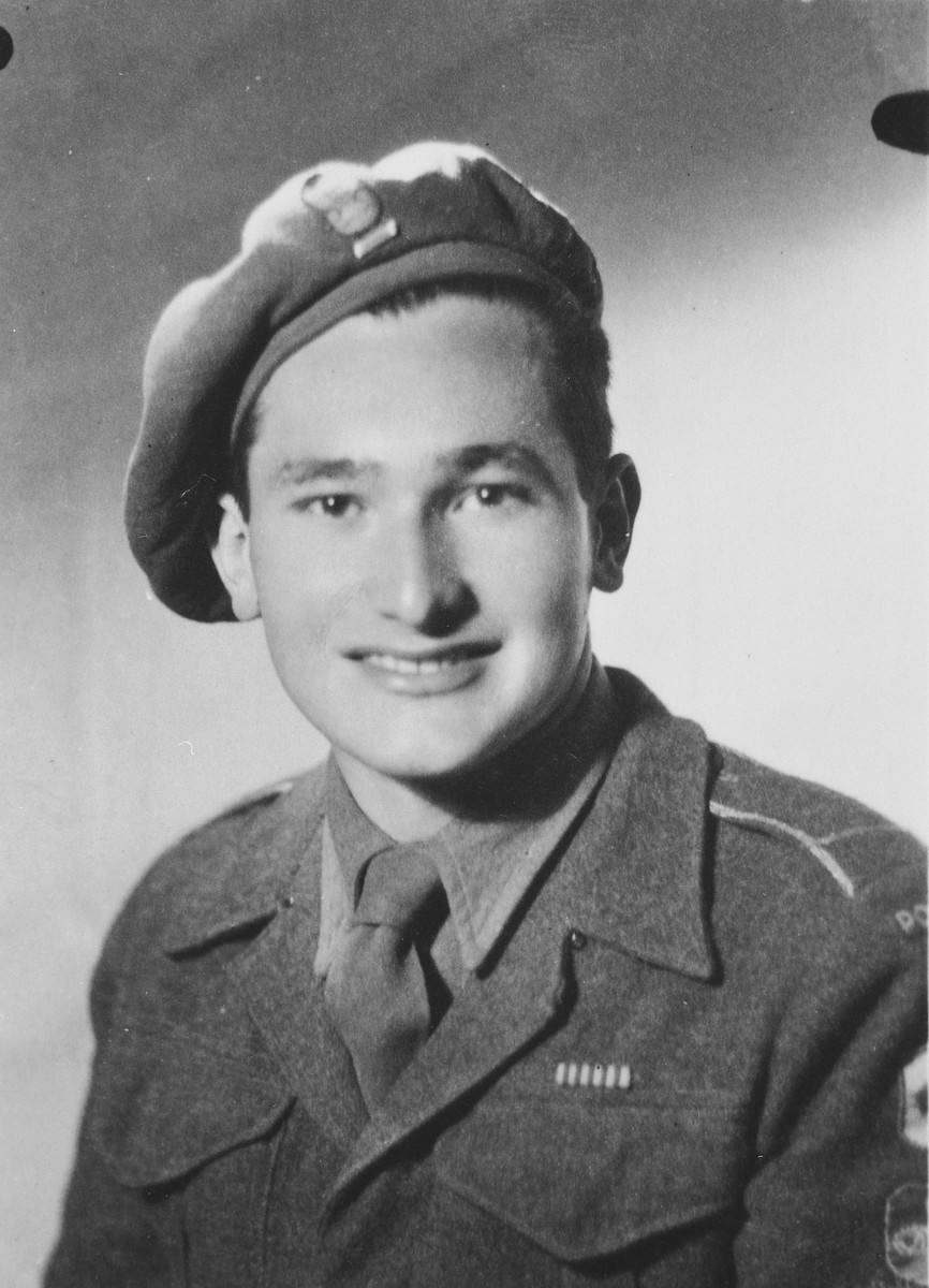 Studio portrait of a Jewish soldier in the Anders Army wearing a ribbon for the Cross of Monte Cassino.

Pictured is Lance Corporal Julian Bussgang.