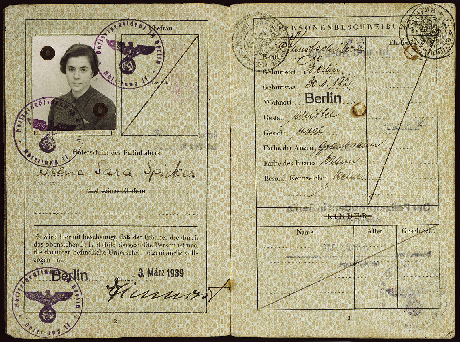 Passport issued to Irene Spicker in March 1939 stamped with the Nazi eagle and displaying the imposed middle name of "Sara".