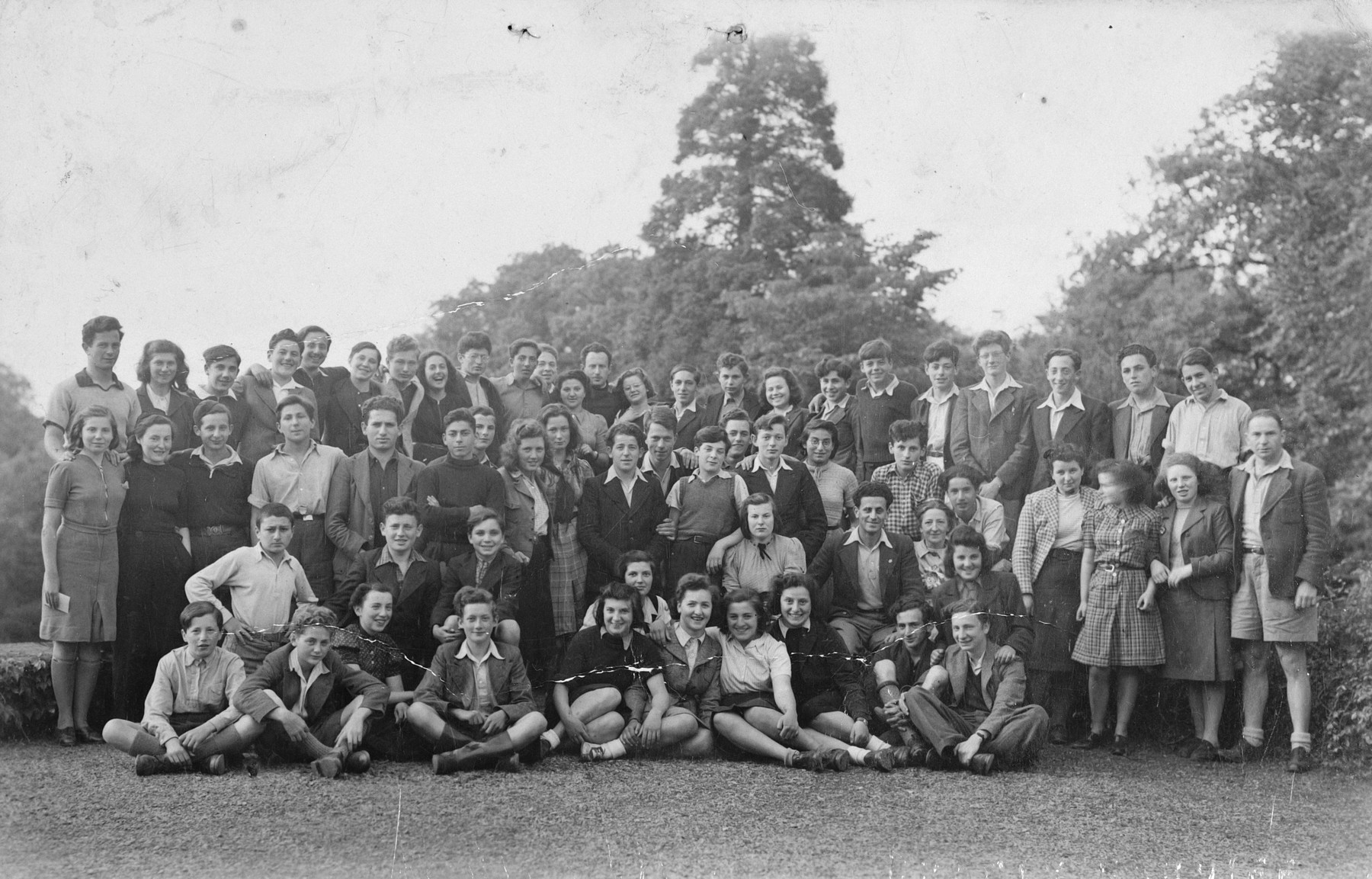 Group portrait of Jewish teenagers, who came to England on a Kindertransport, at a Zionist hachshara in Great Engeham Farm, Kent.