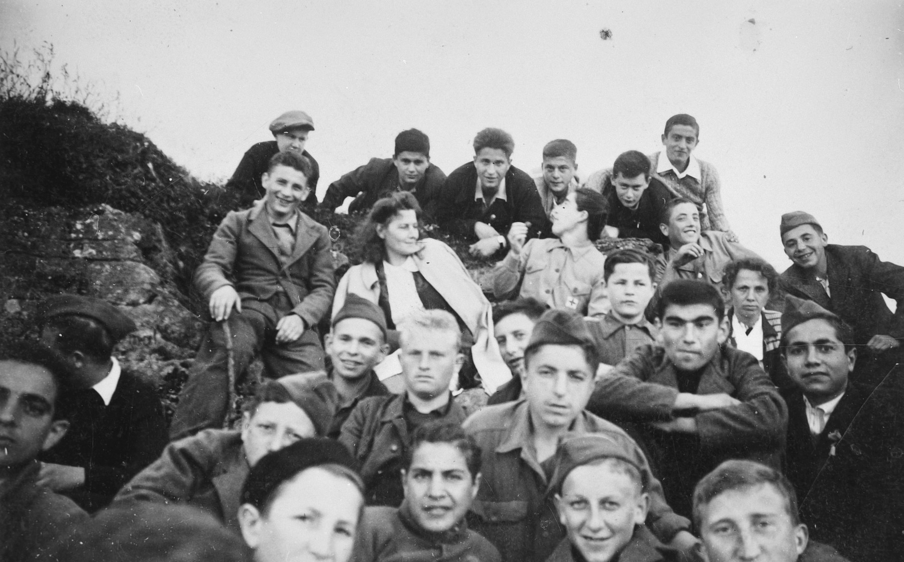 Group portrait of Jewish youth in a children's home in Switzerland.

Moniek Szmulewicz is among those pictured.  Monek (Murry) Goldfinger is on the far right, second from the top.