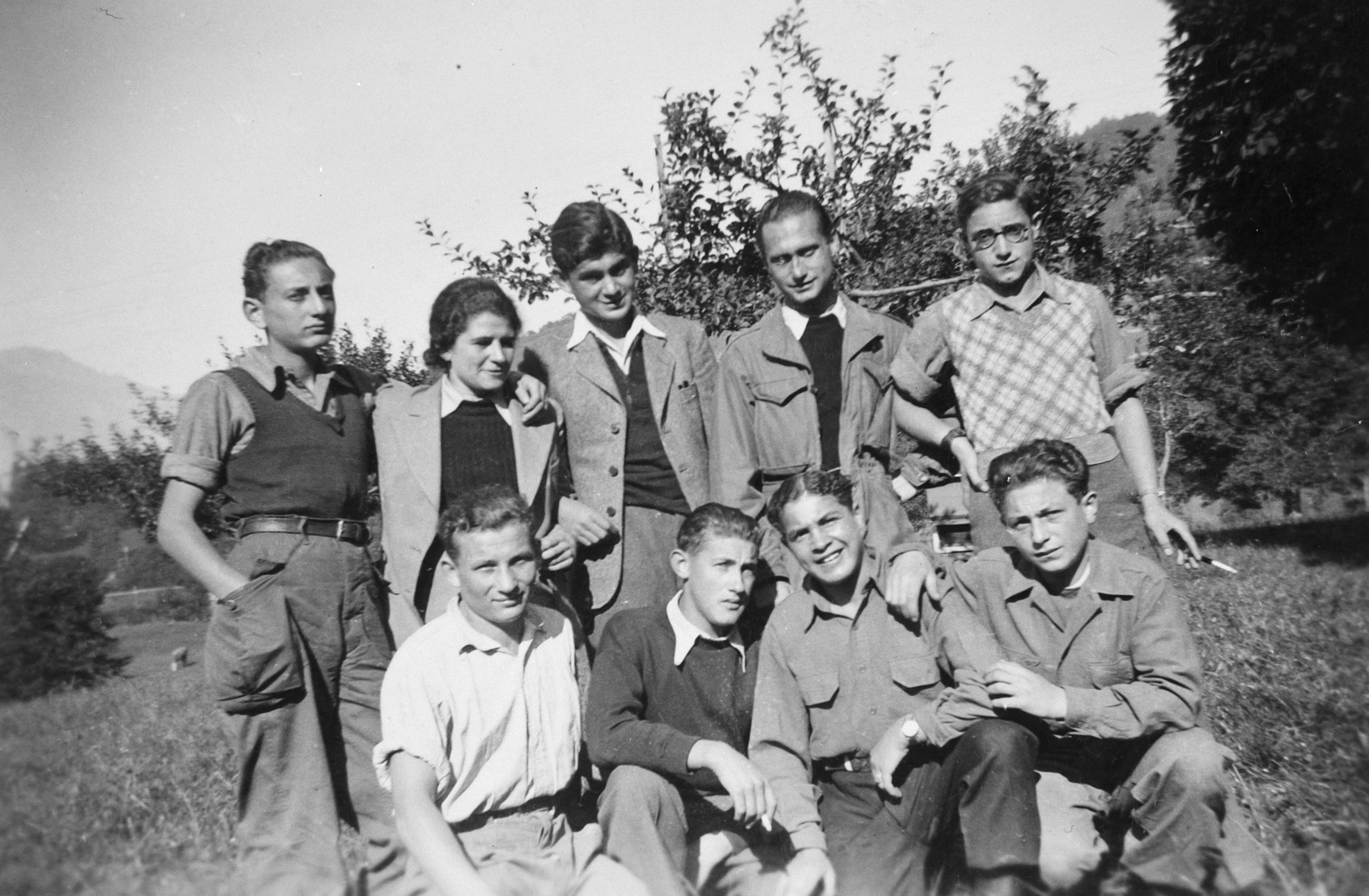 Group portrait of Jewish youth in a children's home in Switzerland.

Moniek Szmulewicz is pictured in the front row, second from the right.  Michael Rosenberg is standing, second row middle.