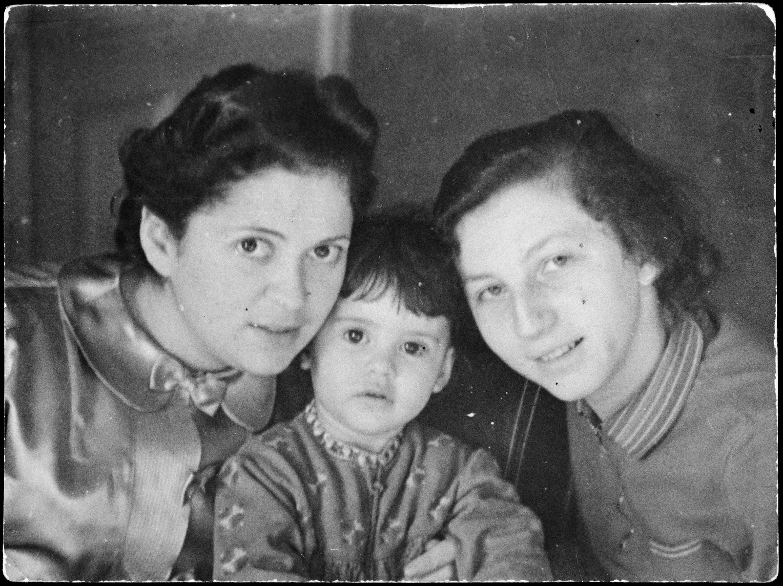 Close-up portrait of two German Jewish women and a young baby girl.

Pictured from left to right are Gertrude Rubenstein, her daughter Ruth Marion and the nanny, also Ruth who perished during the Holocaust