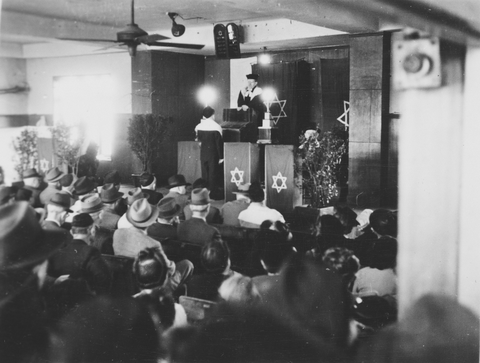 Jewish refugees gather for a religious service in Shanghai.