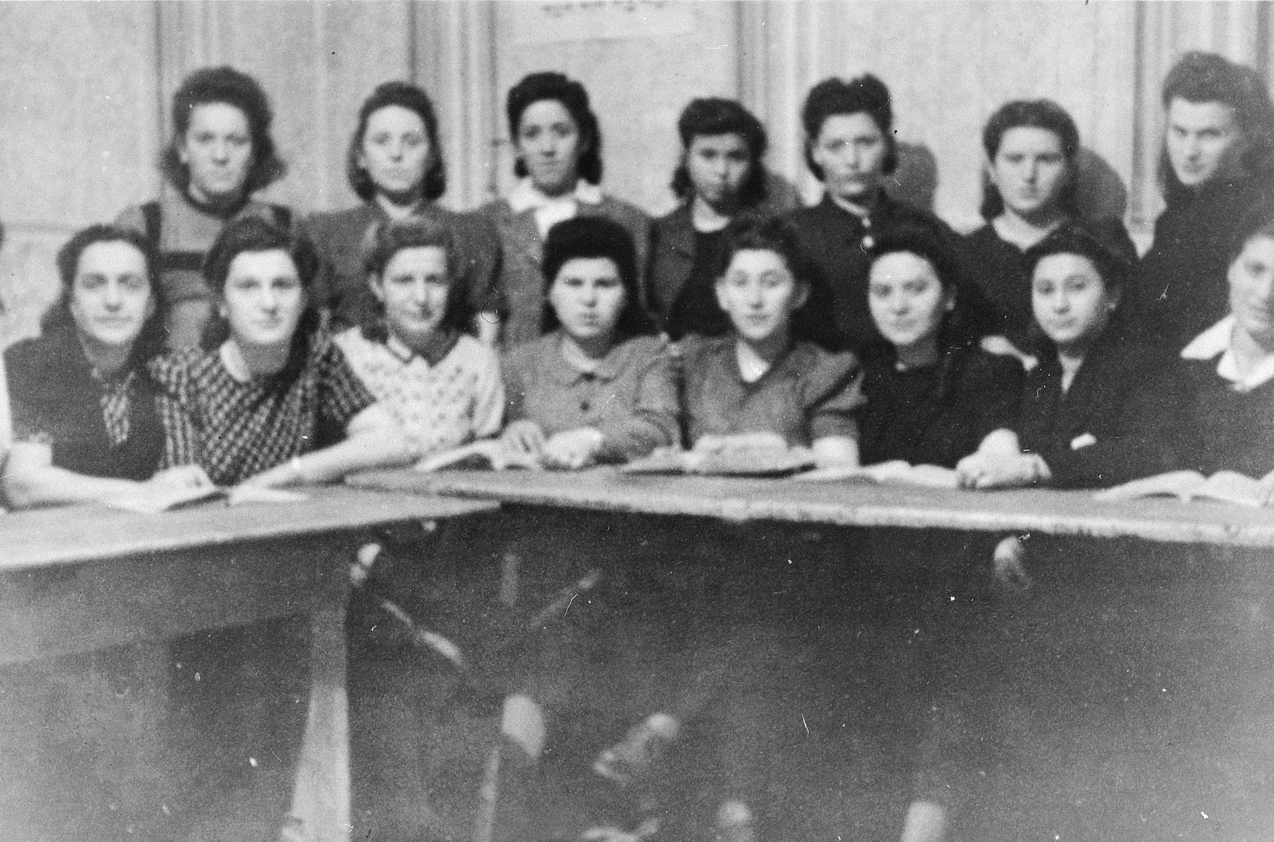 Girls belonging to the religious Mizrachi Zionist youth movement study Torah in the Ziegenhain displaced persons' camp.