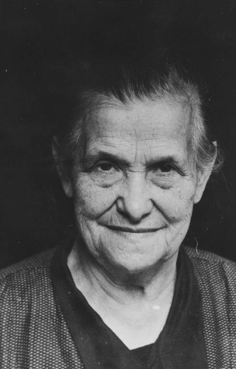Close-up portrait of an elderly Jewish woman in Breisach, Germany.

Pictured is Emilie Geismar (nee Schnurmann).  She died in Breisach from natural causes.

This is part of series of photographs taken of the Breisach Jewish community on their way to and from synagogue in 1937.  In October 1940 the entire community was deported to the Gurs internment camp in southern France.