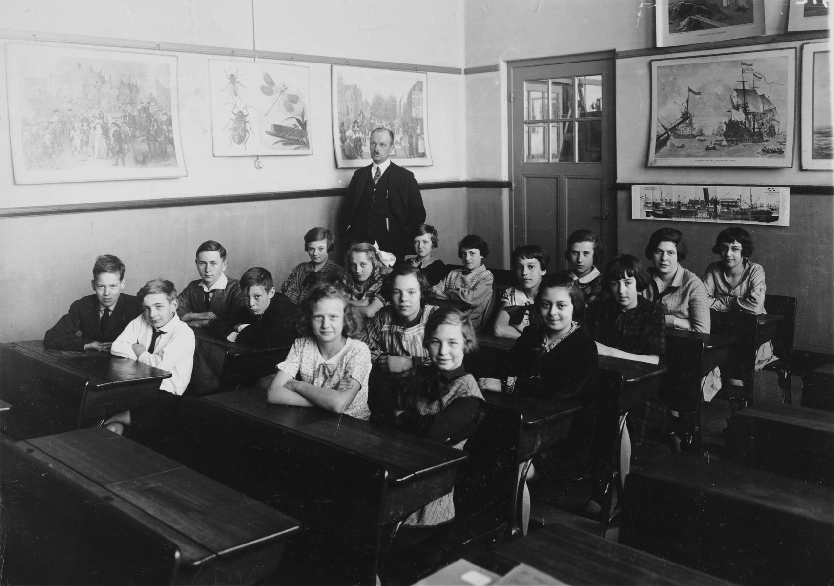 Group portrait of young children and teachers in a class in Amsterdam.