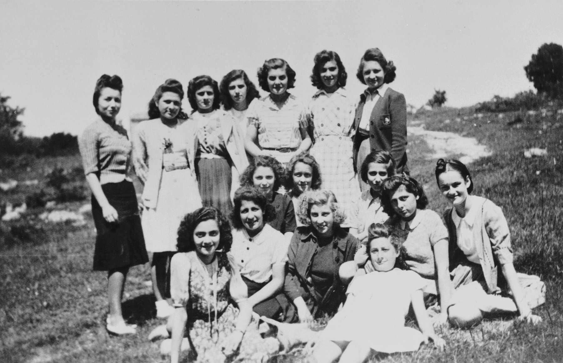 Group portrait of a girl's Latin class on an excursion.

Among those pictured is Ruth Apfel.