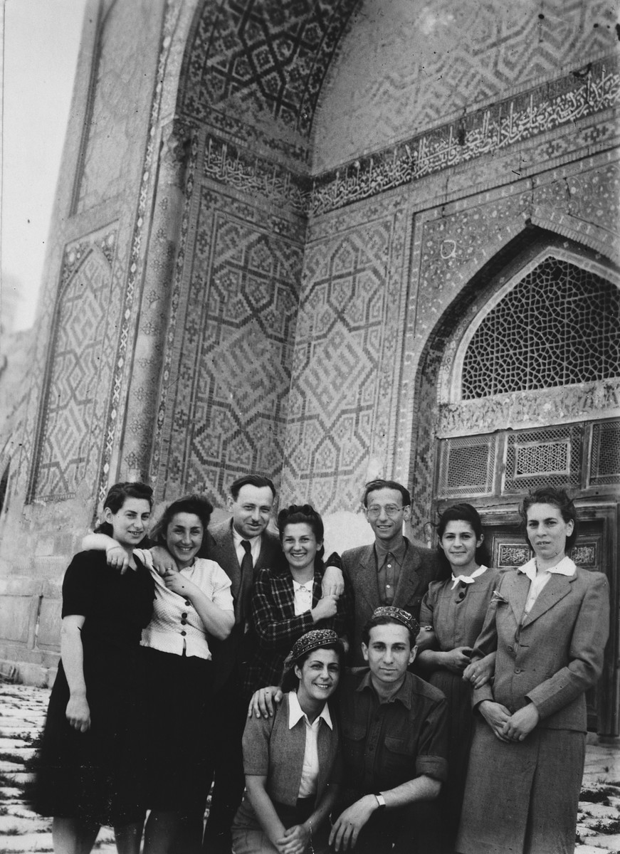 Group portrait of Jewish refugees in Samarkand in front of Tamarlane's tomb.

Seated left to right are Halla Milikowska and Marc Ratner.  Standing left to right are Irka Lichtson, ?, Hewn Stanlsz, Alicja Ratner, ?, Ida Milikowska and Hanka Lichtson.