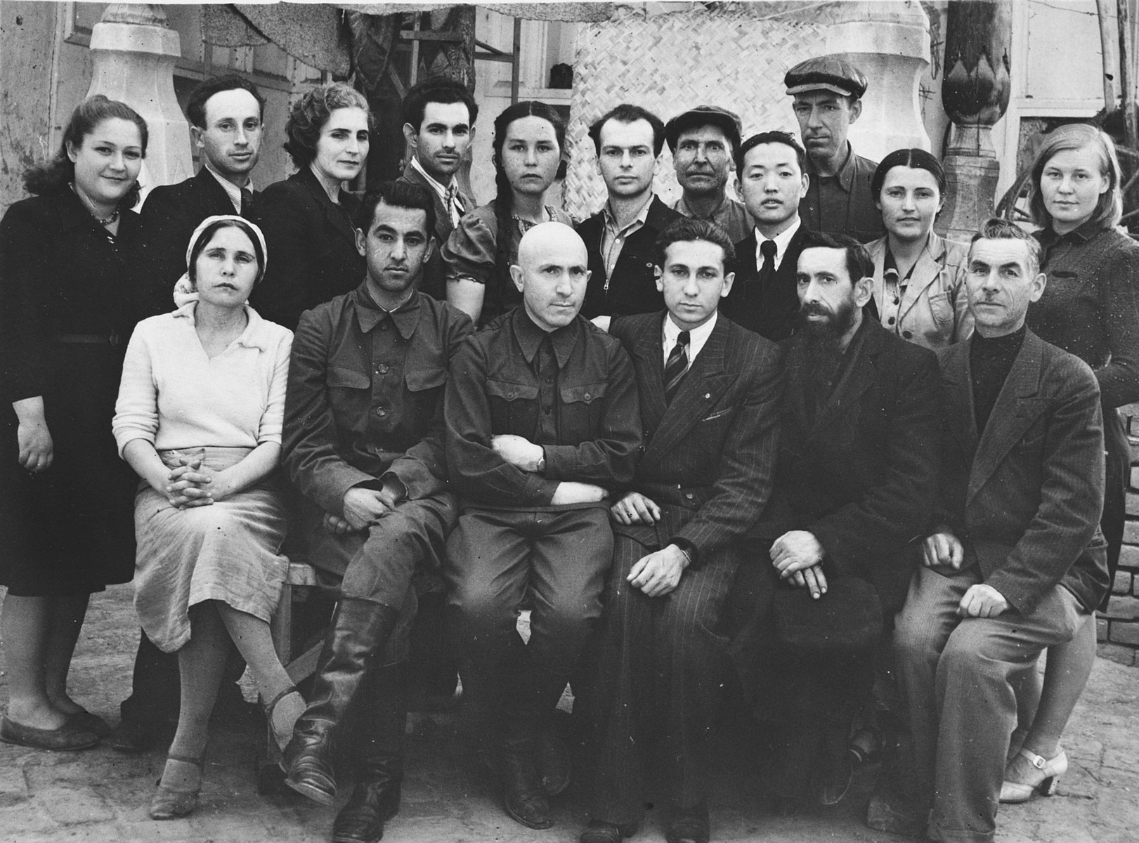 Group portrait of members of a Soviet collective in Samarkand.

Pictured in the center is Marjan Ratner.
