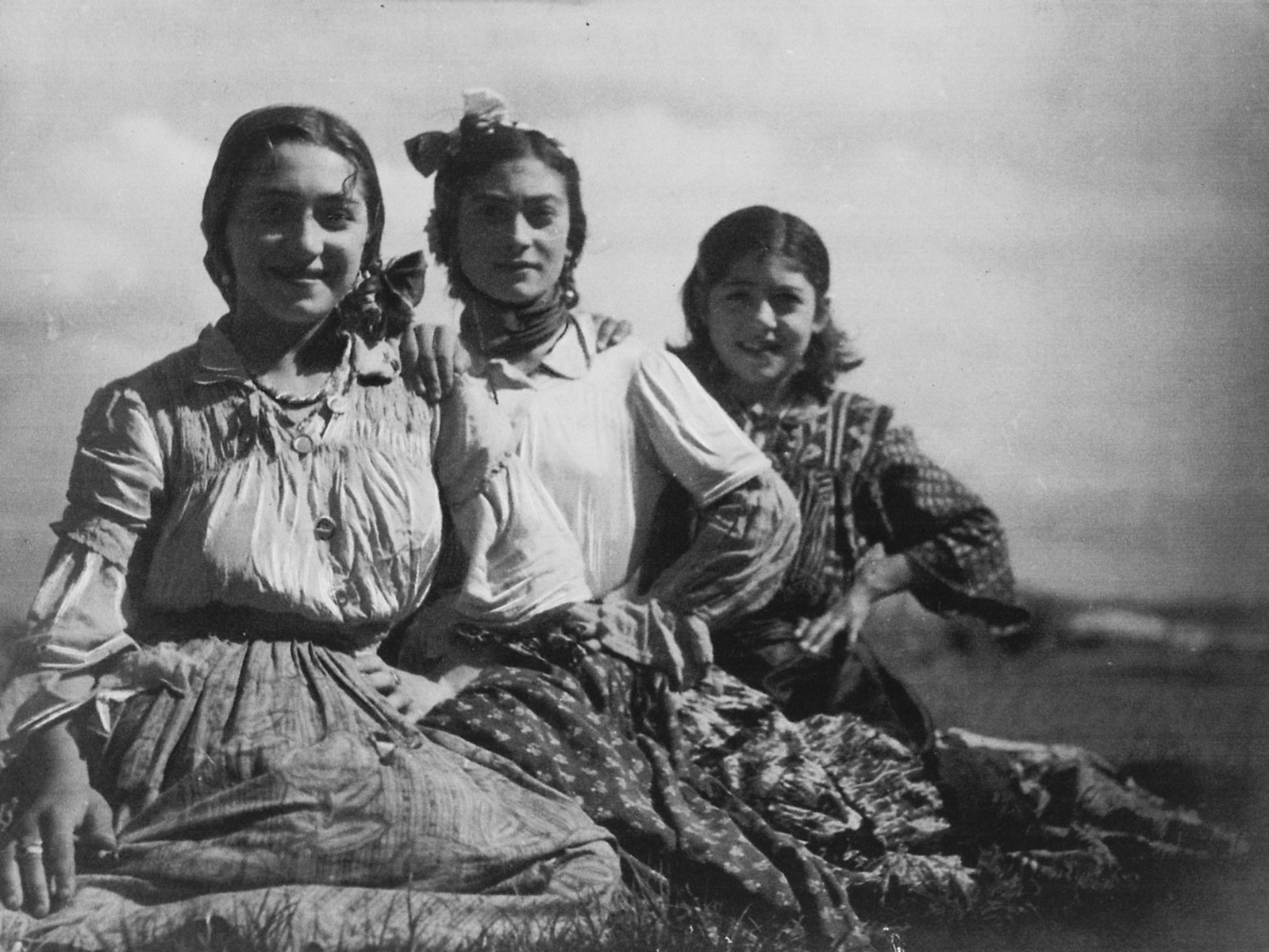 Portrait of three young Romani women.

The caption in "The Heroic Present" reads, "Europe, 1930s.  Women of Pulika's kumpania, including Rosa (left) and Sinza (right)."