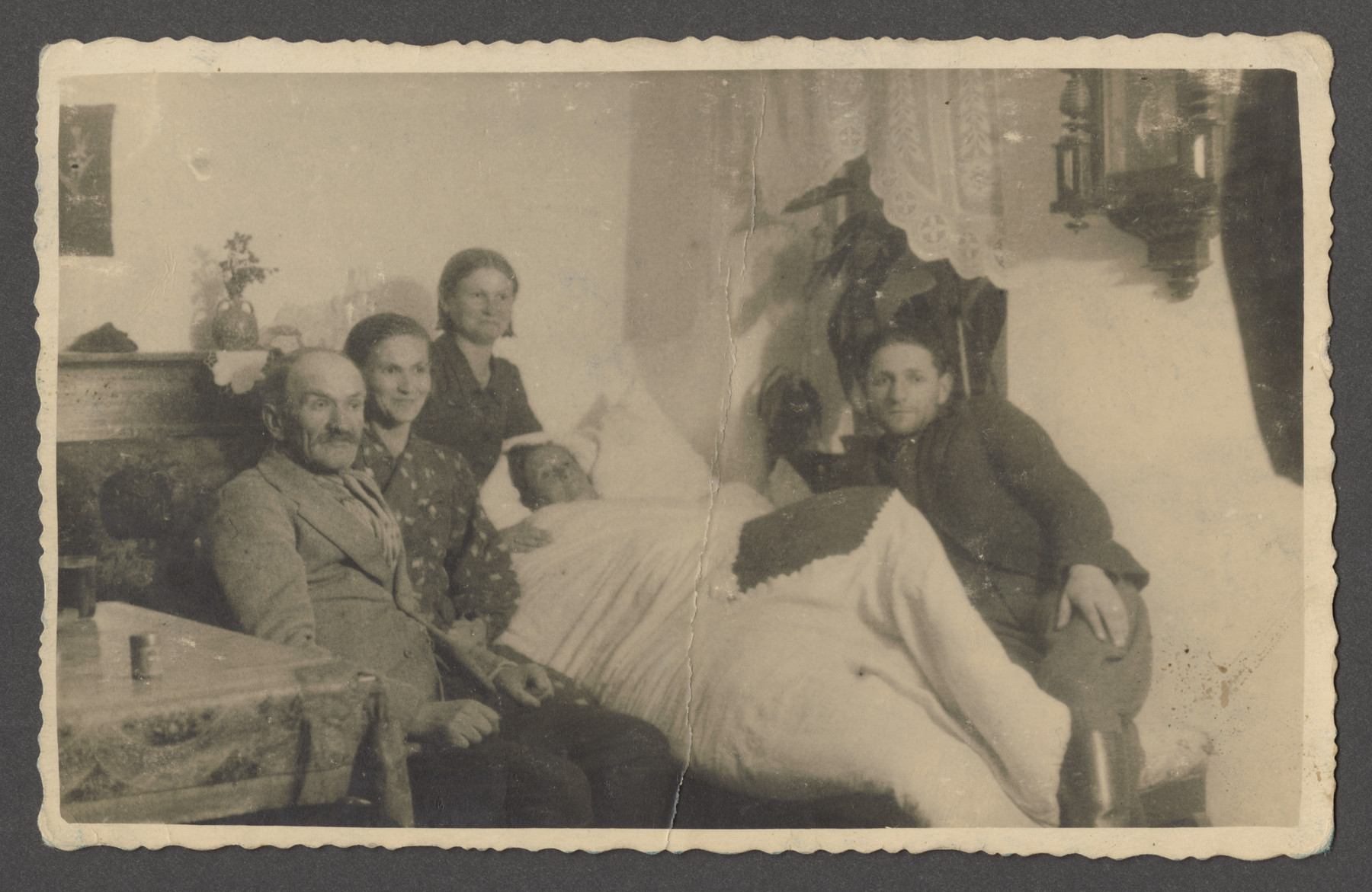 The Szwarcman family gathers around Leah Swzarcman shortly before her death.

Pictured from left to right are Joseph, Sophie, Sonia and Bennick Goldshein (Sophie's husband).