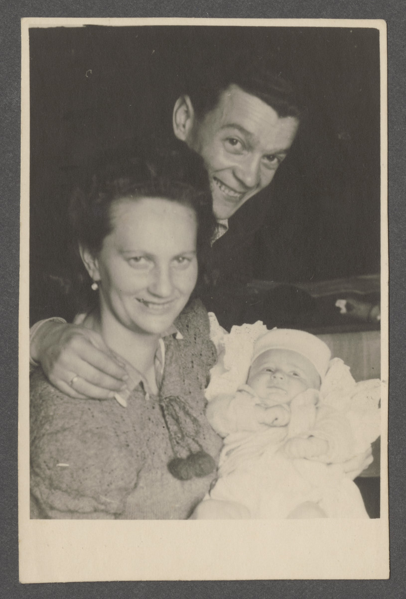 Joseph and Fania Pinczuk hold their newborn son Aaron Jonah in the Wegscheid displaced persons camp in Linz, Austria.