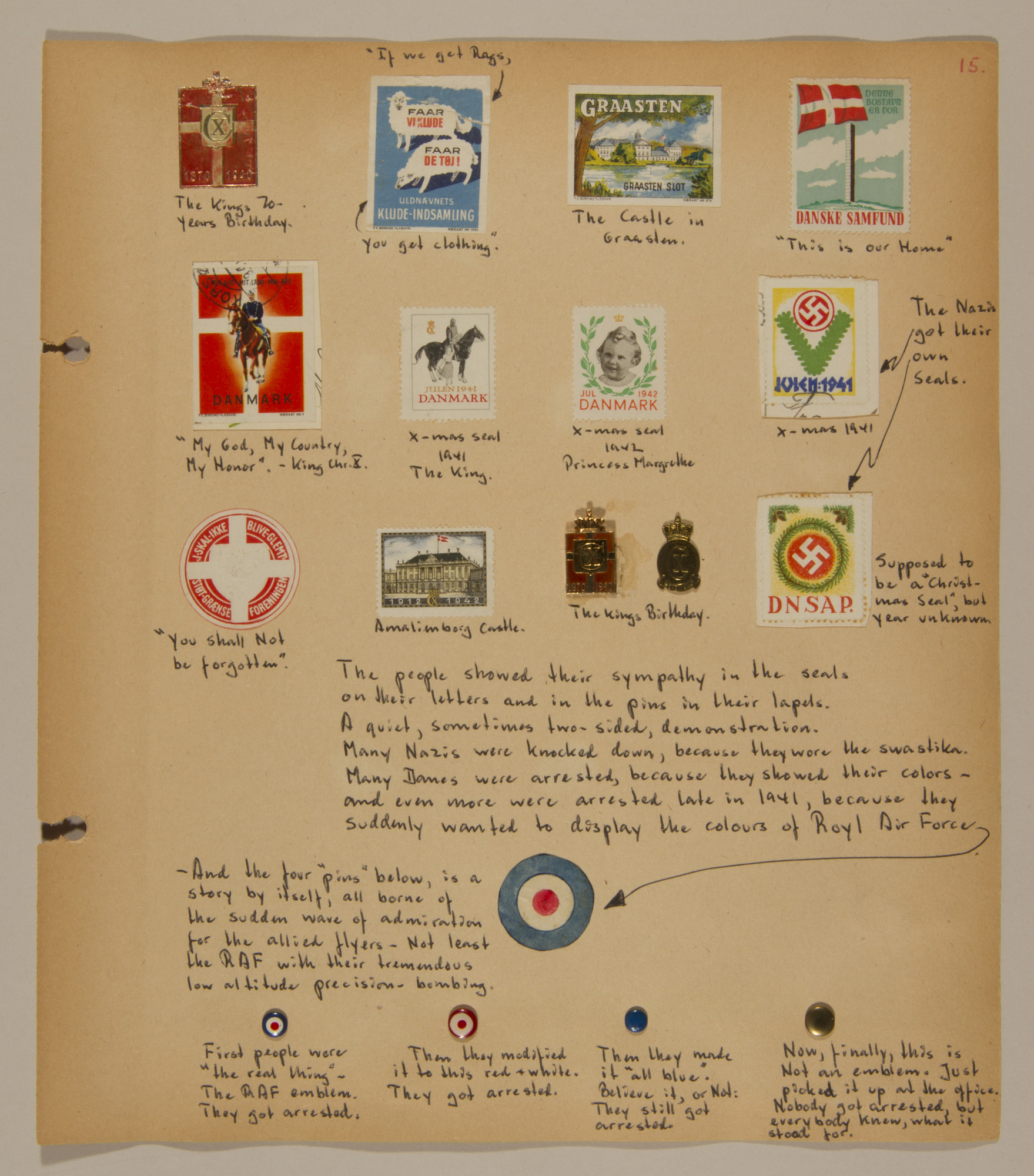 Page from volume two of a set of scrapbooks compiled by Bjorn Sibbern, a Danish policeman and resistance member, documenting the German occupation of Denmark.

This page includes small pins that were worn as a sign of anti-German sentiment.  The intial design copied the RAF emblem.