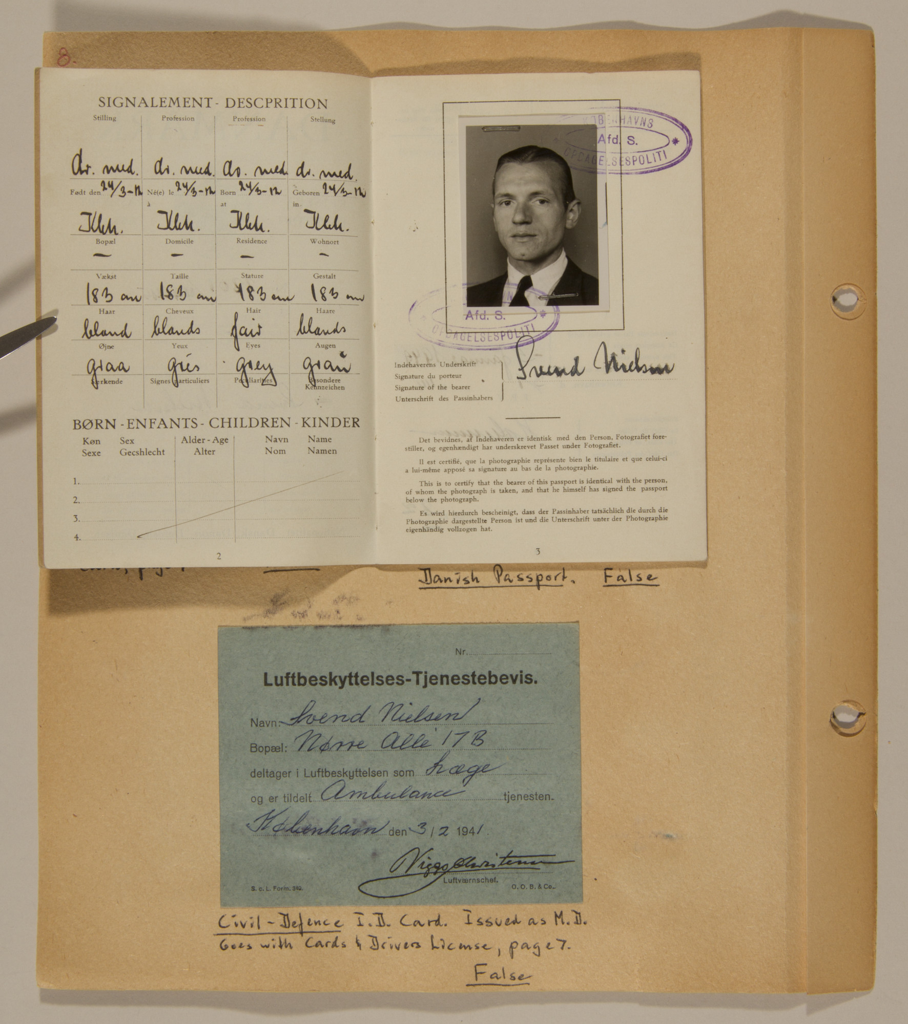 Page from volume three of a set of scrapbooks compiled by Bjorn Sibbern, a Danish policeman and resistance member, documenting the German occupation of Denmark.

This page contains Bjorn Sibbern's (aka Svend Nieslsen's) false identification cards.