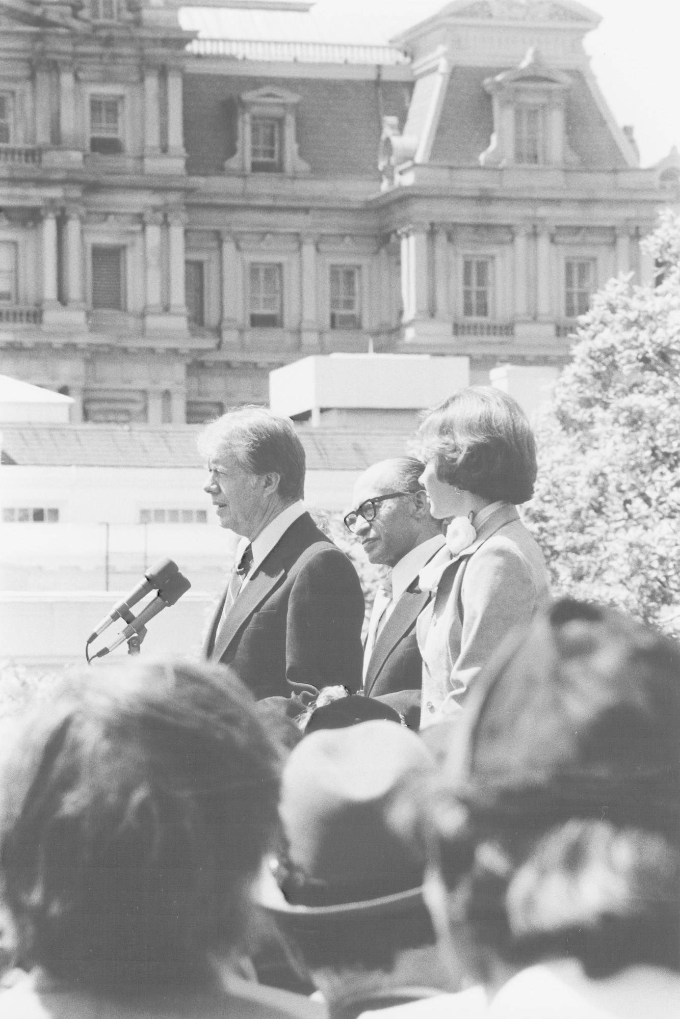 President Jimmy Carter delivers a speech at a White House ceremony marking the establishment of the Holocaust Commission.

Pictured on the podium from left to right are: President Carter, Menachem Begin and Rosalyn Carter.