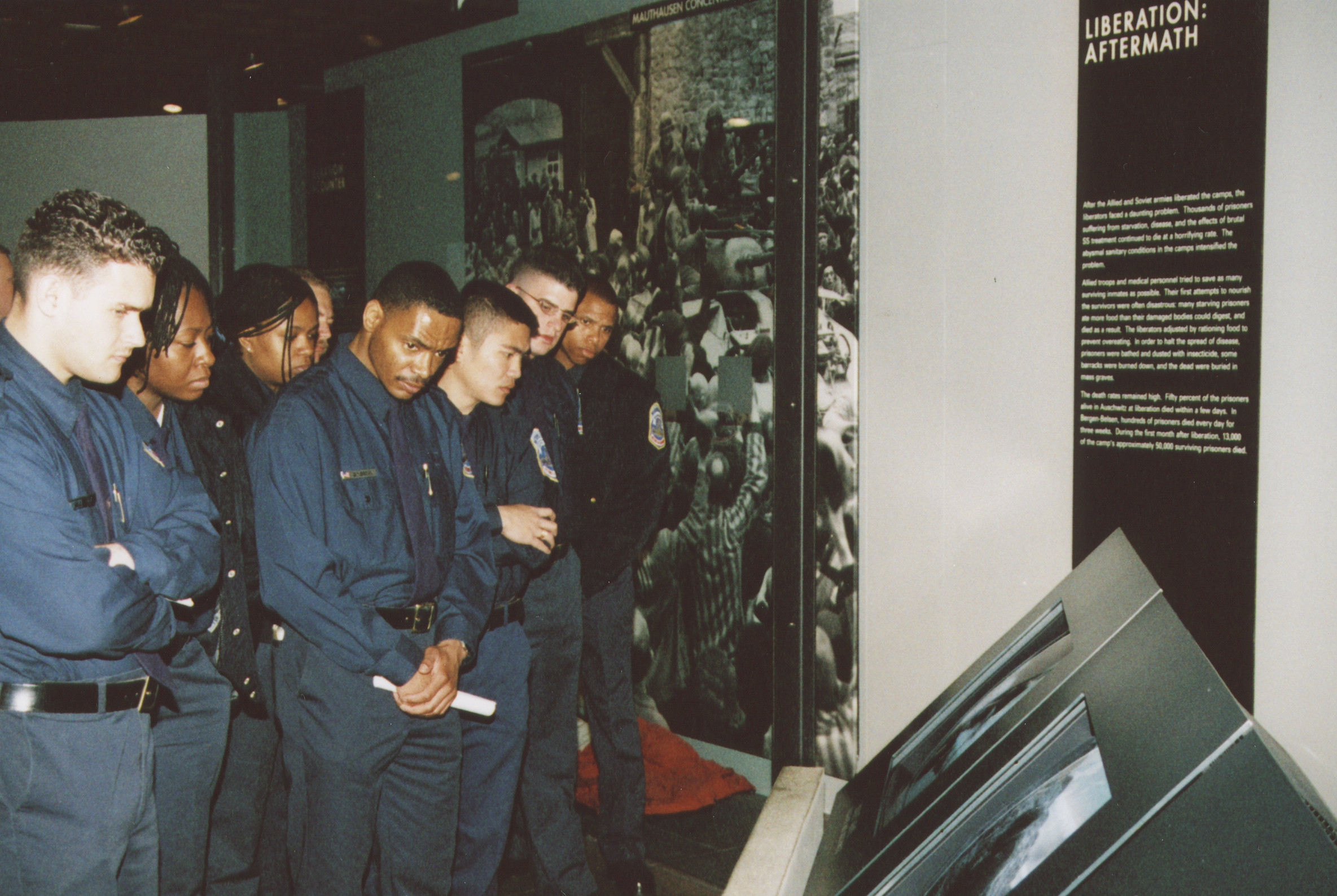 DC police training squad visits the U.S. Holocaust Memorial Museum.  Officers view the Liberation segment of the Permanent Exhibition.