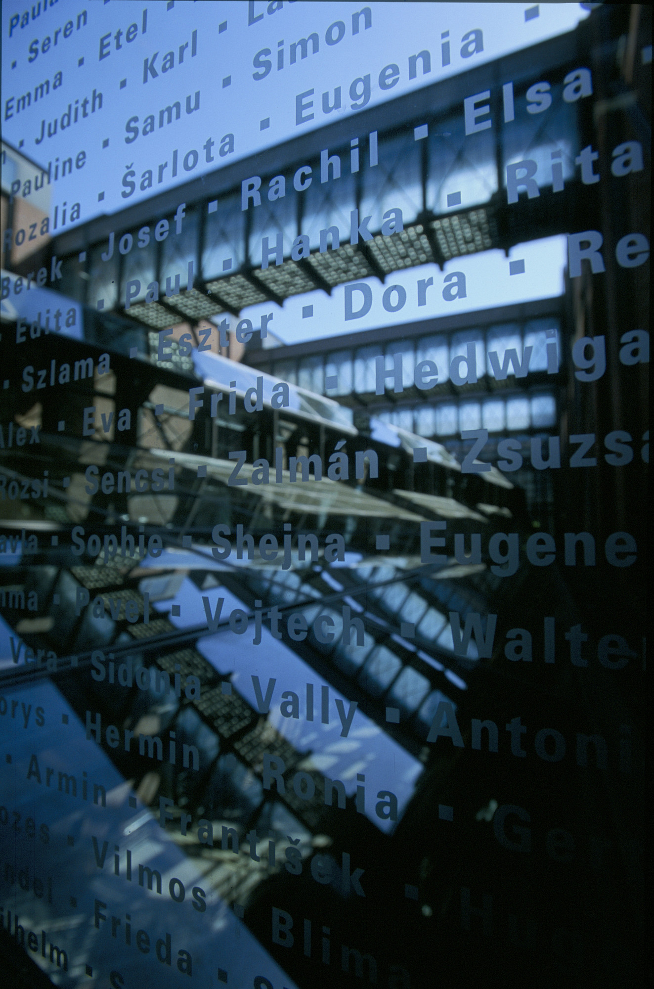 One panel of the glass etched with the first names of Holocaust victims that lines the bridge in the permanent exhibition of the U.S. Holocaust Memorial Museum.