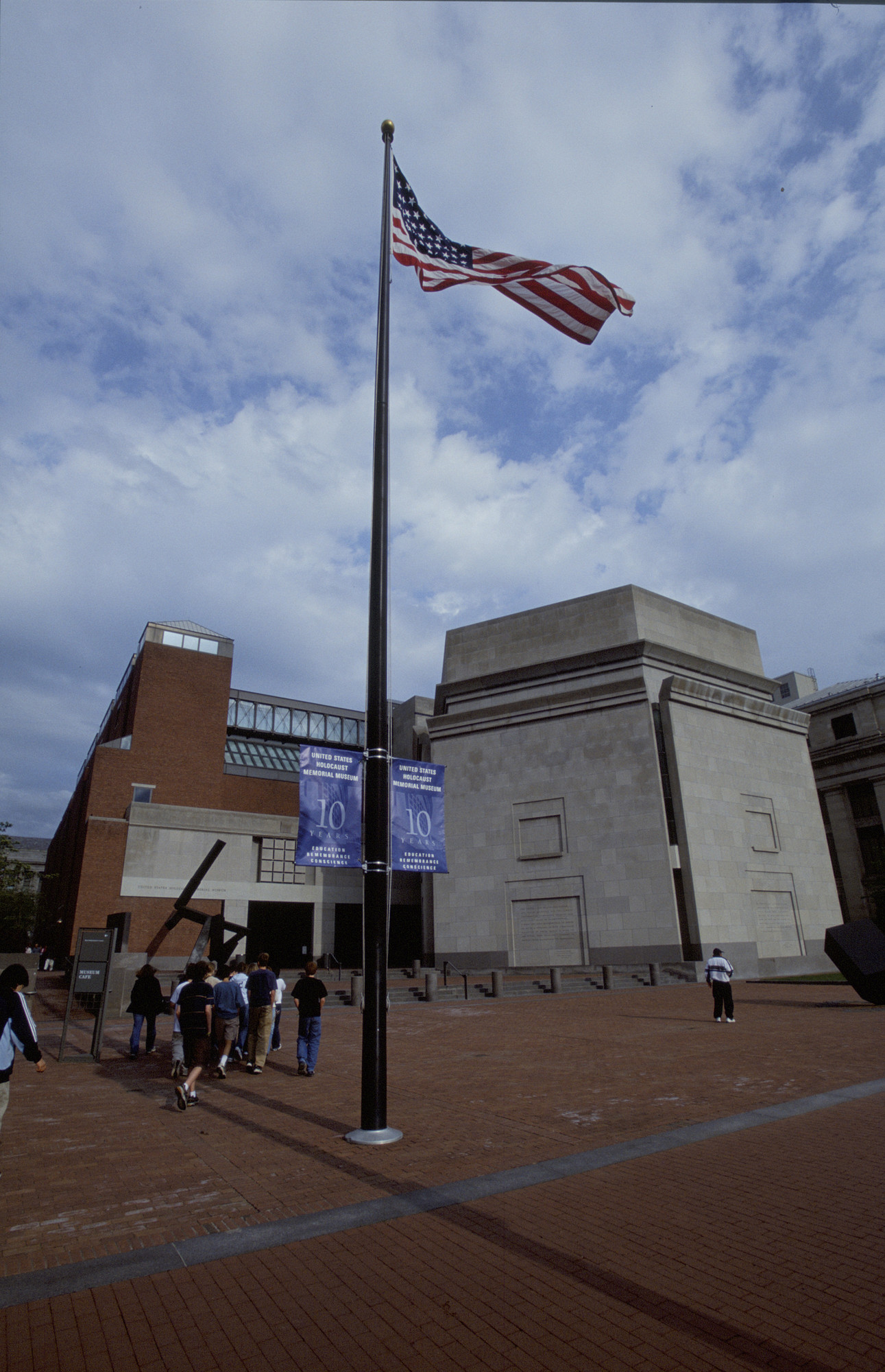 View of Eisenhower Plaza decorated with 10th anniversary banners on the flag pole at the U.S. Holocaust Memorial Museum on the day of its10th anniversary.