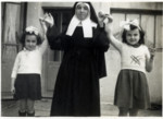 Claire Ridnik  with her cousin Aliette stand with a nun while in hiding.