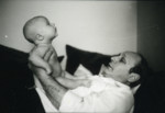 Martin Friedlander holds his first grandchild.