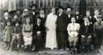 Group photograph of  wedding attendees in Solotvino, Czechslovakia.