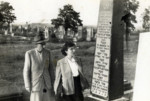 Survivors from Kalisz view a monument to individuals who were killed in the Holocaust.