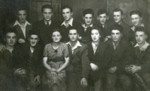 Group portrait of Polish refugees in Vilna.

Among those pictured are Jeszaayahu Kawe (back row, far left) and Yitzhack Boms (back row, fourth from the left).