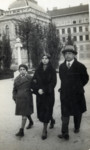 A Hungarian Jewish family walks down the street in Szeged.