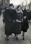 Mala Szwarc and her older sister Leiba Rozenzweig walk down the street in Sosnowiec.