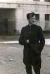 Avraham Sutzveker stands in the ruins of the Vilna ghetto.