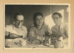 Jewish displaced persons, possibly in Lodz.

Among those pictured is Jeannette Strainsky Spiro (center).