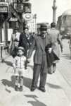 Leon Buka and his son Avraham pose in the street in Sofia, Bulgaria.